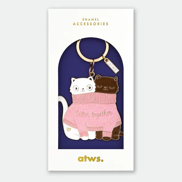 all-the-ways-to-say-2-cats-in-a-sweater-porte-cl-s-chat image 1